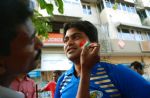 image of Face painting before IPL match, Mumbai