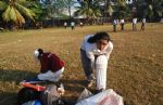 image of Woman padding up for practice, Cross Maidan, Mumbai